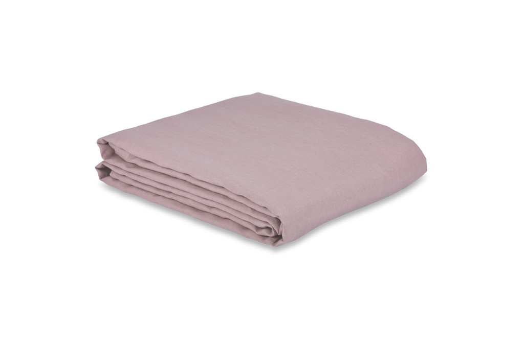Vintage Pink Linen Duvet Cover folded on a White Sheet