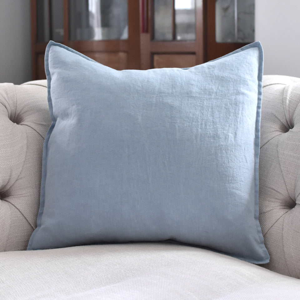 Stone Blue Linen Cushion on a Beige Linen Sofa