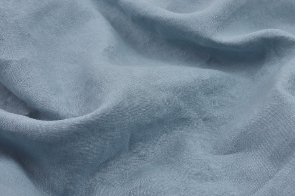 Blue Linen Fabric Swatch on a White Background