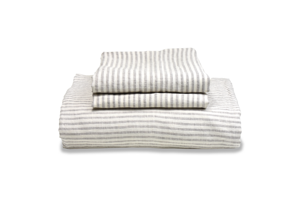 Ticking Linen Striped Duvet Cover and Pillowcase Folded on a stack