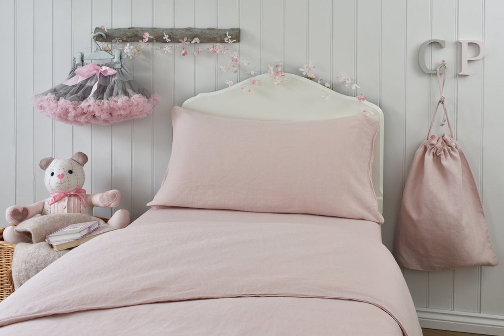Pink Linen Childrens Bedding in a White Painted Bedroom