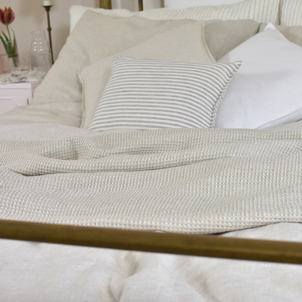 Natural Linen Duvet Set and White Linen Sheets with a Beige Linen Throw