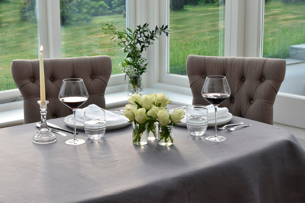 Charcoal Grey Linen Tablecloth on a Dining Table with food