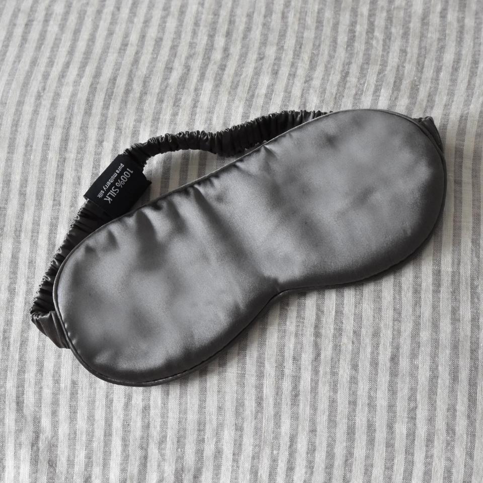 Grey Silk Eye Mask on Ticking Linen Bedding