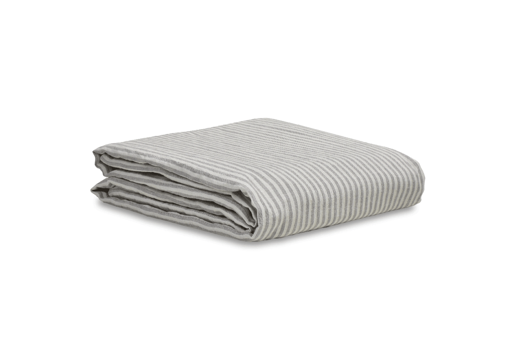 Ticking Stripe Linen Duvet Cover on a White Linen Sheet
