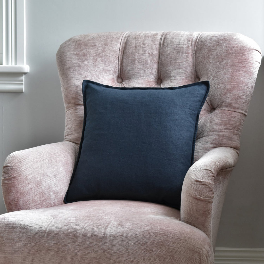 Dark Navy Linen Cushion On A Pink Chair