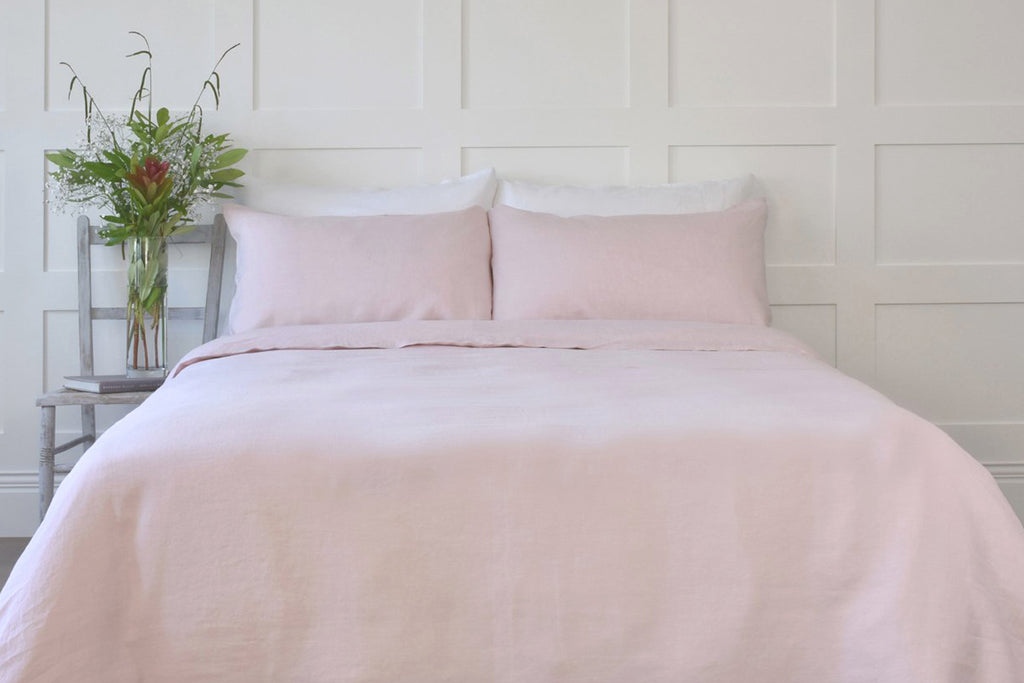 Blush Pink Linen Bedding on a King Bed in a Cream Bedroom