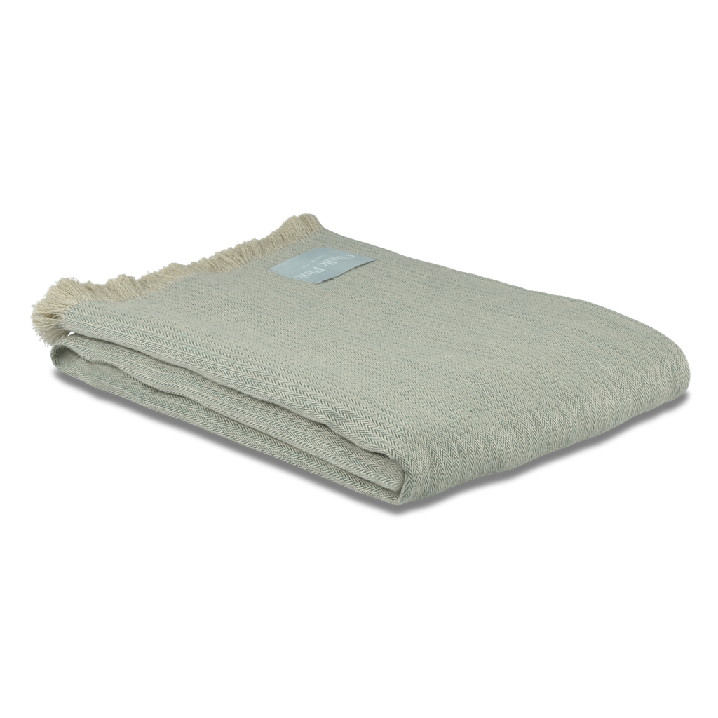 A Sage Green Pure Linen Throw Folded on a White Cut Out Background