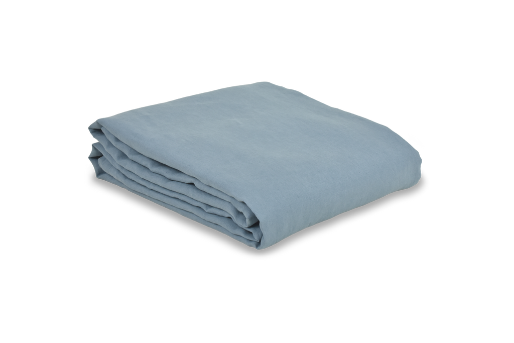 French Blue Linen Duvet Cover folded on a Sheet