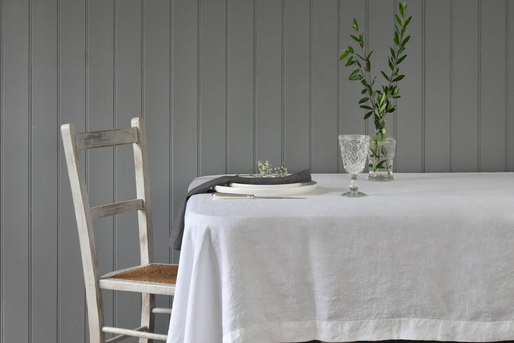 Pure White Linen Tablecloth with Grey Linen Napkins and Silver Cutlery